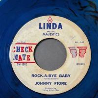 Johnny Fiore Rock A Bye Baby b:w I Don’t Love You Now on Check Mate Clear Blue Vinyl 2 (in lightbox)