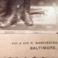 Schutte Baltimore Photographer Cabinet Card Young Boy with His Dog on Table 7.jpg