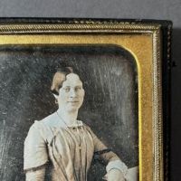 Sixth Plate Daguerrotype Hand Tinted Woman Holding Glasses 3 (in lightbox)