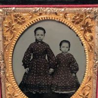 Circa 1870s Ambrotype of Two Sisters Dressed Exactly The Same 3.jpg