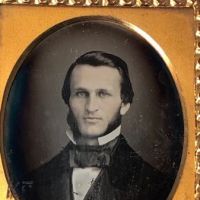 Daguerreotype of man with large square bowtie  stamped Pollack Balto 9.jpg