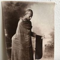 Siam Buddhist Priest with Skeleton Hand Real Photo Postcard 1.jpg
