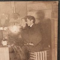 5 Young Men Drinking with Tea Cups By Glowing Lantern Light 3.jpg