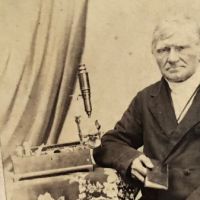 CDV Scientist with Microscope in Loing Black Jacket 3 (in lightbox)