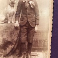Schutte Baltimore Photographer Cabinet Card Young Boy with His Dog on Table 5.jpg