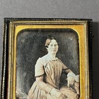 Sixth Plate Daguerrotype Hand Tinted Woman Holding Glasses 1 (in lightbox)