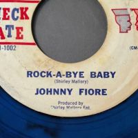 Johnny Fiore Rock A Bye Baby b:w I Don’t Love You Now on Check Mate Clear Blue Vinyl 3 (in lightbox)