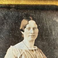Sixth Plate Daguerrotype Hand Tinted Woman Holding Glasses 4 (in lightbox)