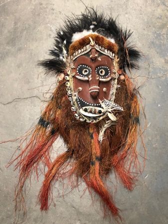 Papua New Guinea Mask Sepik Region with Feathers and Clay and Wood 1.jpg