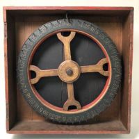 19th C. Vernacular Game of Chance Wheel in Case 1 (in lightbox)