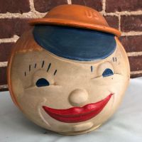 Robinson Ransbottom Cookie Jar Young Girl with US Doughboy Hat Lid 1.jpg