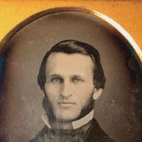 Daguerreotype of man with large square bowtie  stamped Pollack Balto 3.jpg