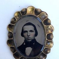 Rose Gold Scalloped Edge Broach with Tintype Portrait of Young man with Beard 1.jpg