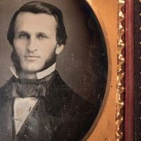 Daguerreotype of man with large square bowtie  stamped Pollack Balto 5.jpg