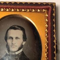 Daguerreotype of man with large square bowtie  stamped Pollack Balto 6.jpg