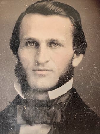 Daguerreotype of man with large square bowtie  stamped Pollack Balto 7.jpg