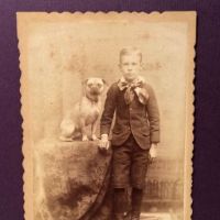 Schutte Baltimore Photographer Cabinet Card Young Boy with His Dog on Table 1.jpg